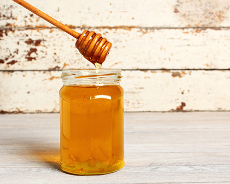 Vente de jus et de miel à la Ferme du Clos de Terre Neuve